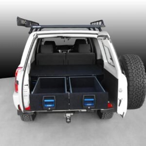 Integrated storage drawer system for Nissan Patrol Y61 (4-door model).